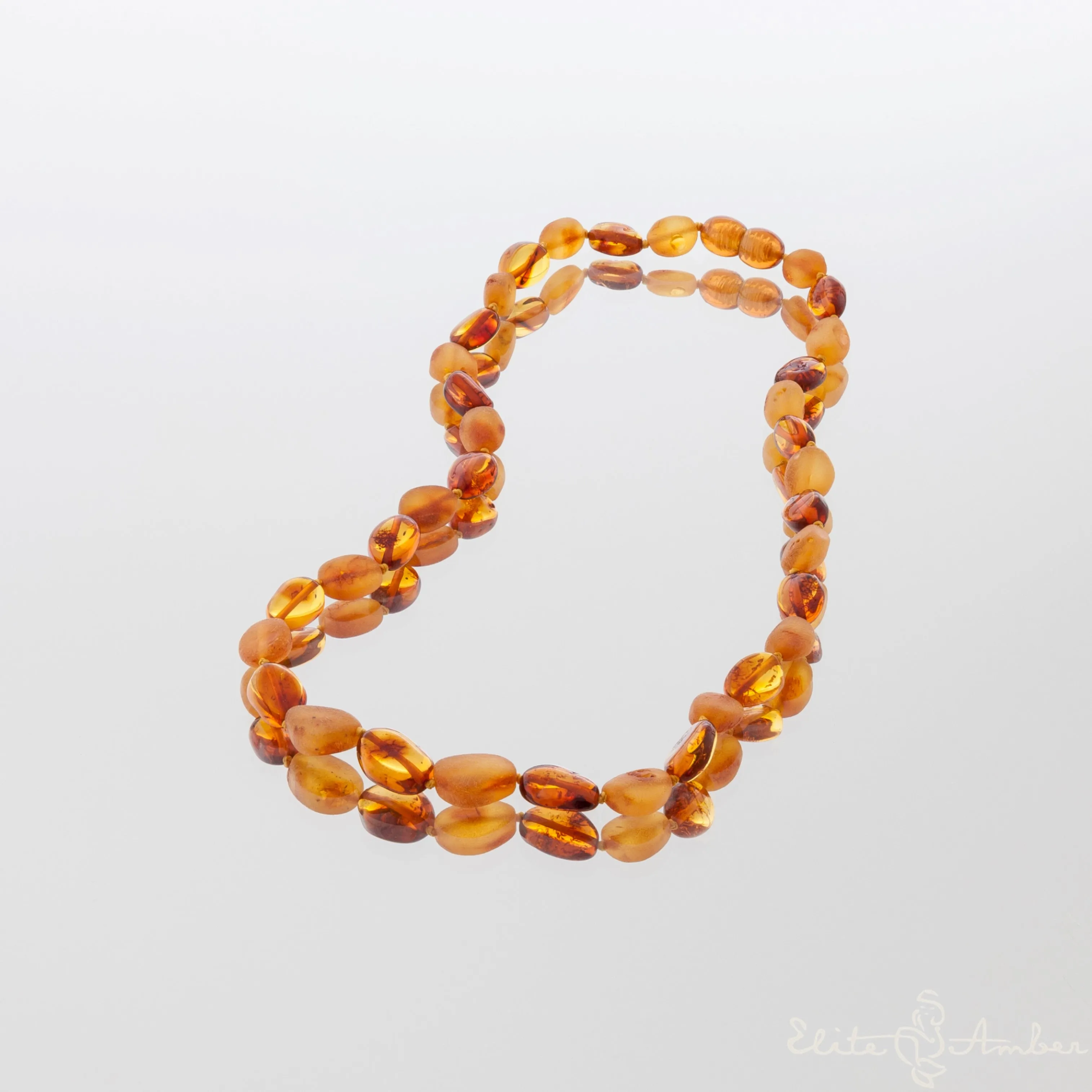 Amber necklace "Polished and raw amber pebbles"