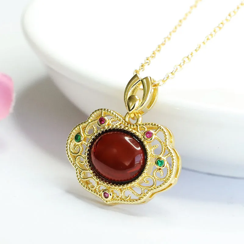 Blood Amber Ruyi Pendant with Sterling Silver Frame and Beeswax Gem