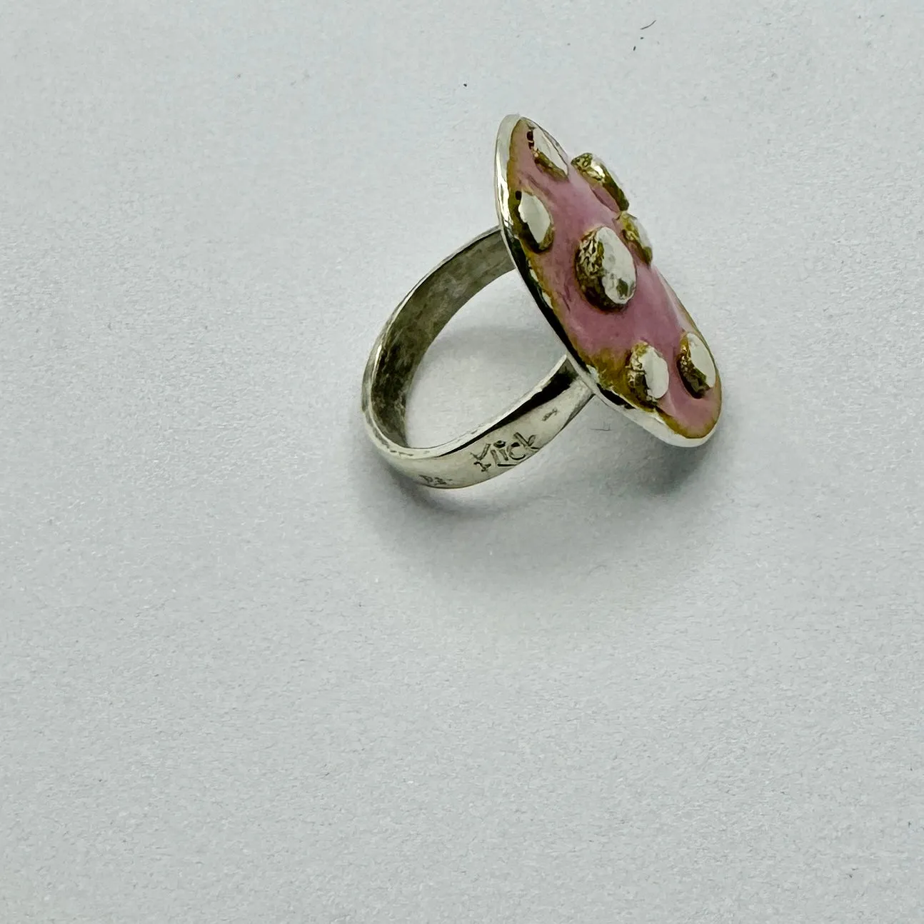 Pink enamel and silver dotty ring